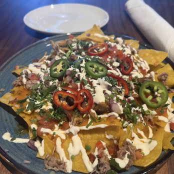 Eureka! - Slow-Roasted Pulled Pork Nachos - American Near Me - Roseville, California Eureka! - Slow-Roasted Pulled Pork Nachos - American Near Me - Roseville, California