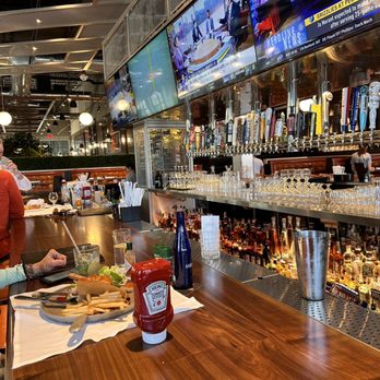 Maggie McFly's® | Boca Raton, FL - a woman at a bar - New American Near Me - Boca Raton, Florida Maggie McFly's® | Boca Raton, FL - a woman at a bar - New American Near Me - Boca Raton, Florida