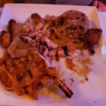 The Cuban - Pork chop with onions and Moros y cristianos. - Cuban Near Me - Patchogue, New York The Cuban - Pork chop with onions and Moros y cristianos. - Cuban Near Me - Patchogue, New York
