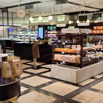 Karl Fazer Café - There are shelves and bins with candies, chocolate, and other treats you can buy - Coffee & Tea Near Me - Helsinki, 18