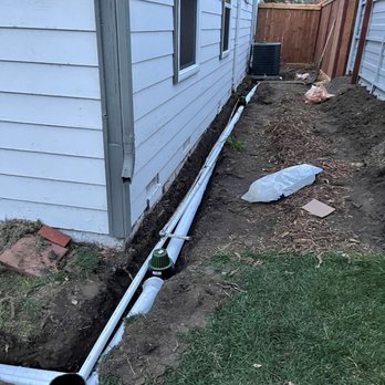 Rain Water Systems - This area was under water at the big rain we had 12/14. Albert's team put in pipes and a french drain to draw the water away. - Gutter Services Near Me Rain Water Systems - This area was under water at the big rain we had 12/14. Albert's team put in pipes and a french drain to draw the water away. - Gutter Services Near Me