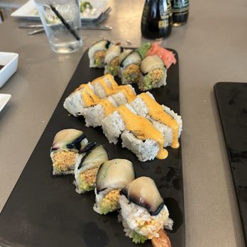 Ponzu Sushi and Grill - Black Dragon (bottom and top): so bland and boring Calamari Roll: no meat just rice - Sushi Bars Near Me - Omaha, Nebraska Ponzu Sushi and Grill - Black Dragon (bottom and top): so bland and boring Calamari Roll: no meat just rice - Sushi Bars Near Me - Omaha, Nebraska