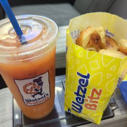 a drink and french fries a drink and french fries