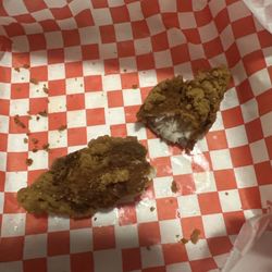 Mr Wonderfuls Chicken and Waffles - Dry overcooked chicken tender.