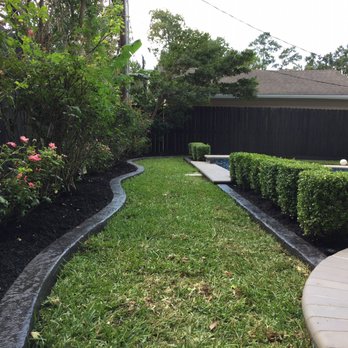 Texas Curb n Borders - a view of a pool and landscaping - Masonry/Concrete Near Me - Houston, Texas