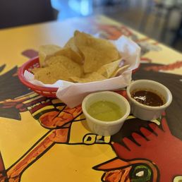 Complimentary house made chips and salsas (verde and spicy) Complimentary house made chips and salsas (verde and spicy)