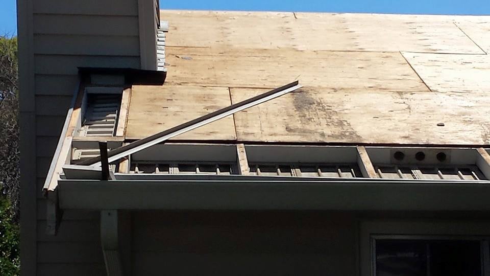 Slide of Freeman Roofing