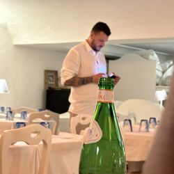 La Cambusa - Here's the server to stay away from... on the phone. Empty restaurant. Poor service.