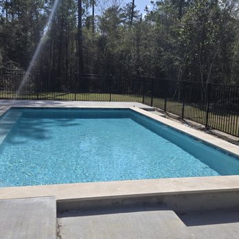 Hilltop Fences - view into the pool area and of our fence - Fences & Gates Near Me - Covington, Louisiana Hilltop Fences - view into the pool area and of our fence - Fences & Gates Near Me - Covington, Louisiana