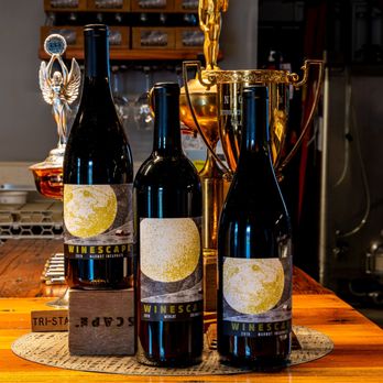 Winescape Winery - three bottles of wine on a table - Wine Tasting Room Near Me - Spokane, Washington