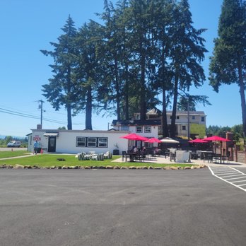 West Hills Vineyards - The exterior of the tasting room, with the patio to the right, and a former governor's historic house. - Wine Tasting Room Near Me - Salem, Oregon West Hills Vineyards - The exterior of the tasting room, with the patio to the right, and a former governor's historic house. - Wine Tasting Room Near Me - Salem, Oregon