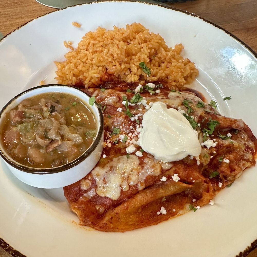 The Porch - Smoked Brisket Enchiladas w correct beans and rice - Southern Near Me - Dallas, Texas The Porch - Smoked Brisket Enchiladas w correct beans and rice - Southern Near Me - Dallas, Texas