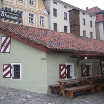 Historische Wurstkuchl - View from river side. Picture I have seen on-line indicate there are many more tables when the weather is nice. - German Near Me - Regensburg, BY Historische Wurstkuchl - View from river side. Picture I have seen on-line indicate there are many more tables when the weather is nice. - German Near Me - Regensburg, BY