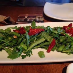 Arugula asparagus with sundries tomatoes and almonds- sparse almonds and small portions Arugula asparagus with sundries tomatoes and almonds- sparse almonds and small portions