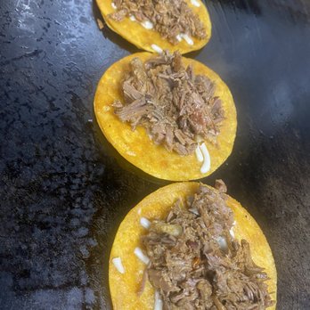 Tacos El Poblanito - three tacoss being cooked - Food Trucks Near Me - Brooklyn, New York Tacos El Poblanito - three tacoss being cooked - Food Trucks Near Me - Brooklyn, New York