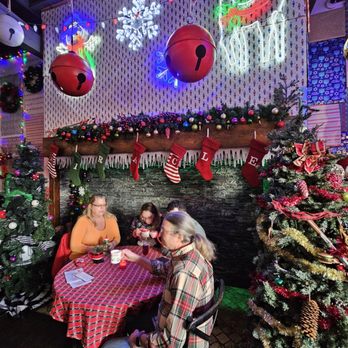 Overlook Lodge: A Rustic Watering Hole - Several Christmas trees. - Cocktail Bars Near Me - Cincinnati, Ohio