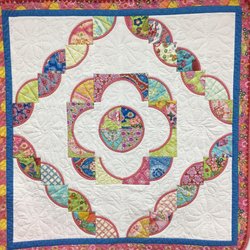 Lollipops Quilt Shop - The Flower Garden Quilt...a very easy Drunkards Path design using our bias bindings to complete quickly...fully precut Quilt Kits available