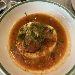 Blackened catfish creole on grits