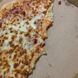 a half eaten pizza in a box a half eaten pizza in a box
