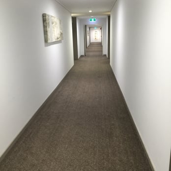Peppers Salt Resort & Spa - One the resort's wings with a long hallway. - Hotels Near Me - Kingscliff, NSW