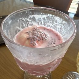 Falooda is a strawberry drink with ice cream it's really tasty seems to also have chia seeds. Semi sweet drink really good