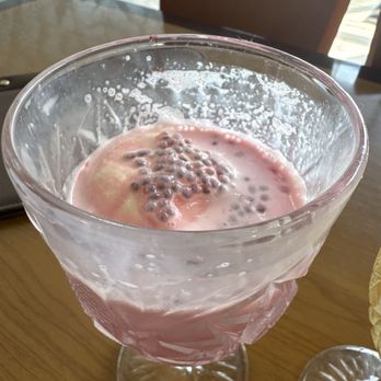 Silver Spoons - Falooda is a strawberry drink with ice cream it's really tasty seems to also have chia seeds. Semi sweet drink really good - Indian Near Me - Conroe, Texas