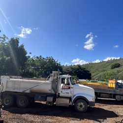 STM Equipment Rentals - Tandem axle and single axle dump trucks for hauling in and out materials.
