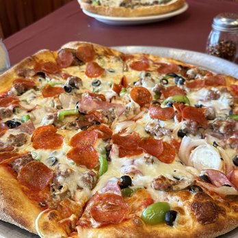 De Luca's Restaurant - The De Luca Special pizza was packed with toppings: mushrooms, onions, pepperoni, black olives, Canadian bacon, sausage and green peppers. - Pizza Near Me - San Diego, California De Luca's Restaurant - The De Luca Special pizza was packed with toppings: mushrooms, onions, pepperoni, black olives, Canadian bacon, sausage and green peppers. - Pizza Near Me - San Diego, California