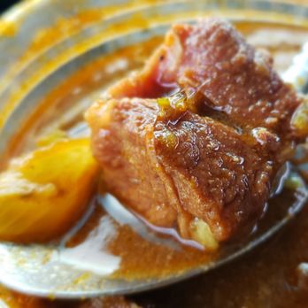 Immy's African Cuisine - The tender curry goat - African Near Me - Milwaukee, Wisconsin