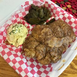 Pigg-Ah-Boo's - Fried pork chop, collard greens and potato salad.