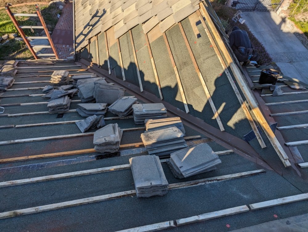 Slide of Nathan Roofing