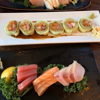 Momo Sushi - Top to bottom: Sashimi Deluxe, Naruto Roll, Tri-color Sashimi - Japanese Near Me - Minneapolis, Minnesota Momo Sushi - Top to bottom: Sashimi Deluxe, Naruto Roll, Tri-color Sashimi - Japanese Near Me - Minneapolis, Minnesota