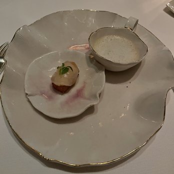 Jean-Georges - Amuse Bouche of scallop over crispy rice with a soup foam side - French Near Me - New York, New York Jean-Georges - Amuse Bouche of scallop over crispy rice with a soup foam side - French Near Me - New York, New York