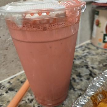 Dona Leti's - Strawberry horchata topped with cinnamon and whipped cream - Cocktail Bars Near Me - Houston, Texas