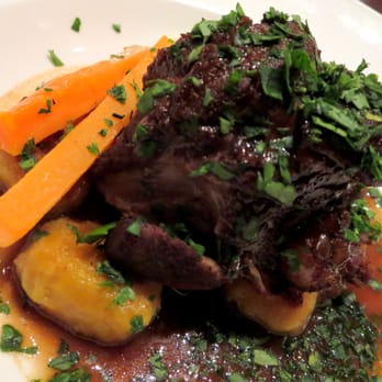Explorer's Lounge - Braised Lamb Shank with Sweet Potato Gnocchi - New American Near Me - Baltimore, Maryland