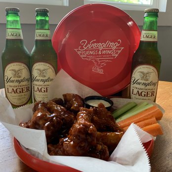 J&D's Wagon Wheel - a basket of wings, carrots, celery, and beer - Bars Near Me - Cooperstown, New York J&D's Wagon Wheel - a basket of wings, carrots, celery, and beer - Bars Near Me - Cooperstown, New York