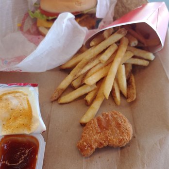 Wendy's - a chicken sandwich, fries, and ketchup - Burgers Near Me - Sterling, Virginia