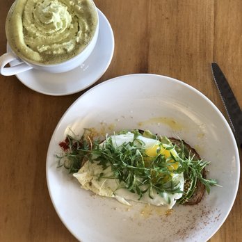 Fàme Caffe - Avocado toast with an over easy egg, "muddy water" latte - matcha with espresso topped with matcha whip cream! Delicious! - Coffee & Tea Near Me - Phoenix, Arizona Fàme Caffe - Avocado toast with an over easy egg, "muddy water" latte - matcha with espresso topped with matcha whip cream! Delicious! - Coffee & Tea Near Me - Phoenix, Arizona