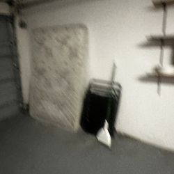 Orlando Vacation Rental Homes - Dirty mattress left in garage