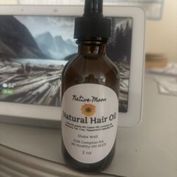 Native Moon Apothecary - This is the 2 ounce bottle of natural hair oil. The owner recommend that I use on my scalp.