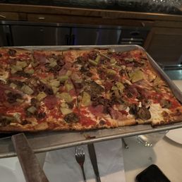 Artichoke, olive, prosciutto, and mushroom