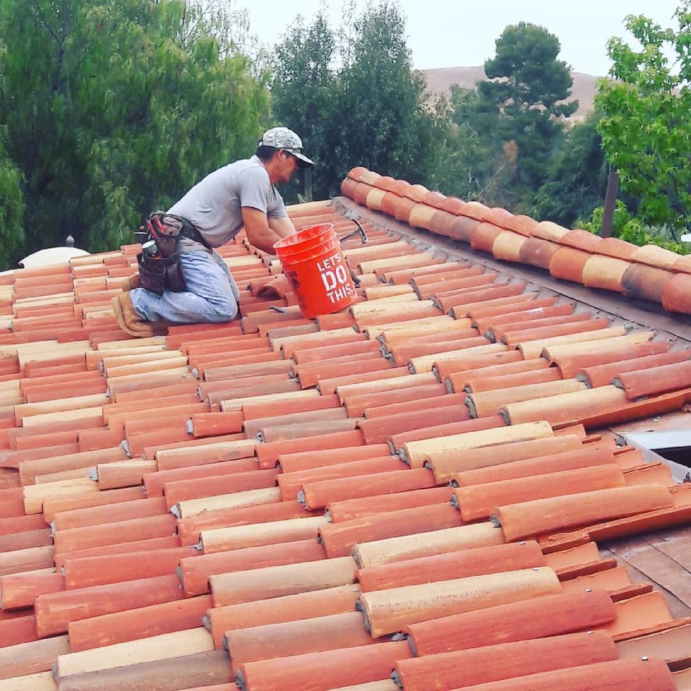 Slide of JL Roofing Company