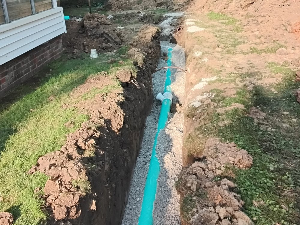 Slide of Rogers Drain Solutions