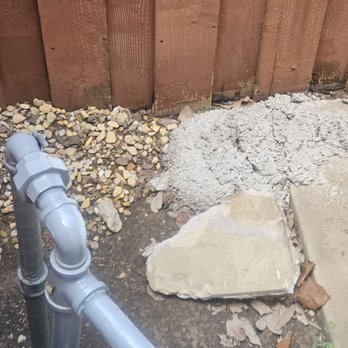 Patio Enclosures - The extra concrete they left near my fence. - General Contractors Near Me Patio Enclosures - The extra concrete they left near my fence. - General Contractors Near Me