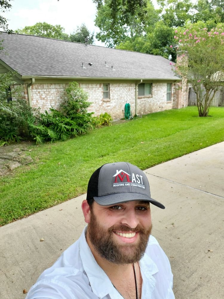 Slide of Mast Roofing & Construction