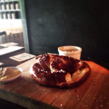 Berliner Pub - Scrumptious pretzel with beer cheese soup. - German Near Me - Renton, Washington Berliner Pub - Scrumptious pretzel with beer cheese soup. - German Near Me - Renton, Washington