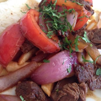 Machu Picchu - This beef dish has great flavor but its cooked like past well done - Peruvian Near Me - Somerville, Massachusetts