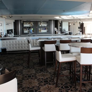 Pacific View Tower by Wedgewood Weddings - The bar in the cocktail lounge. At night the blue area on the ceiling lights up. - Venues & Event Spaces Near Me - Oxnard, California Pacific View Tower by Wedgewood Weddings - The bar in the cocktail lounge. At night the blue area on the ceiling lights up. - Venues & Event Spaces Near Me - Oxnard, California