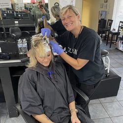 Elite School of Cosmetology - Panama City - This is me doing my teacher, Miss Shelly 's hair. She has done hair for 30 years when I tell you I learned from the best. It's a fact.