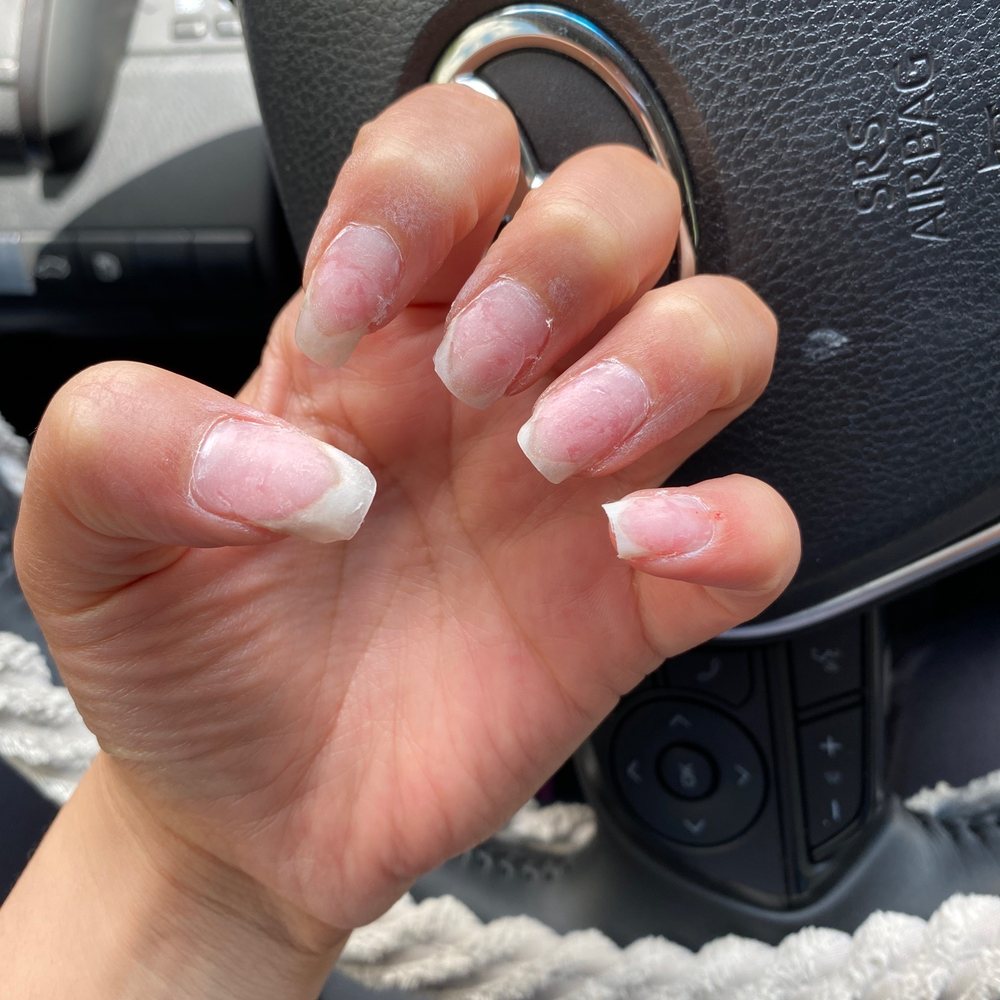 This is how I had to leave because she only cut three nails and not the rest